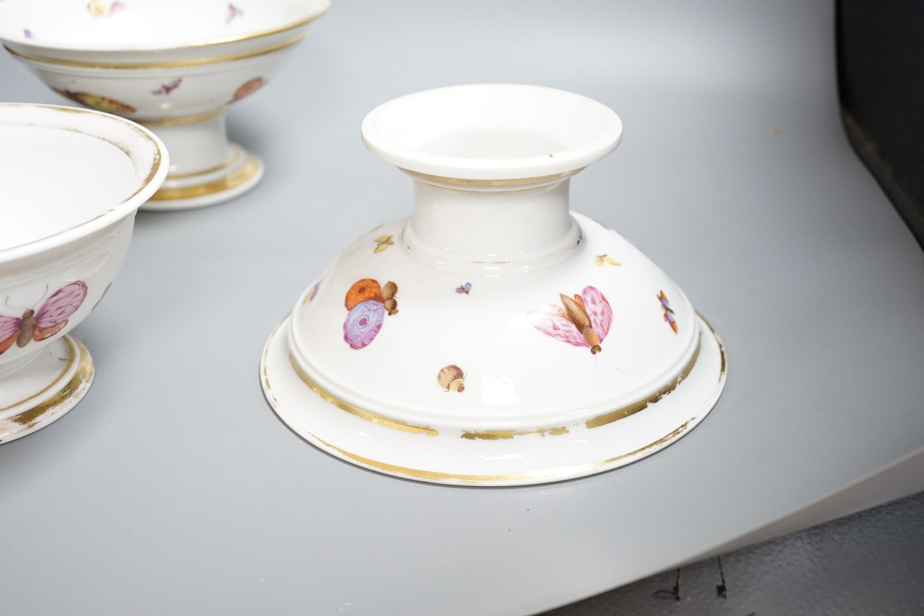 A pair of mid 19th century Paris porcelain ‘butterfly’ comports and similar example (3)